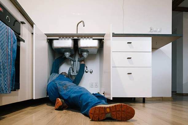 Professional Emergency Plumber technician working in Bunker Hill, IL